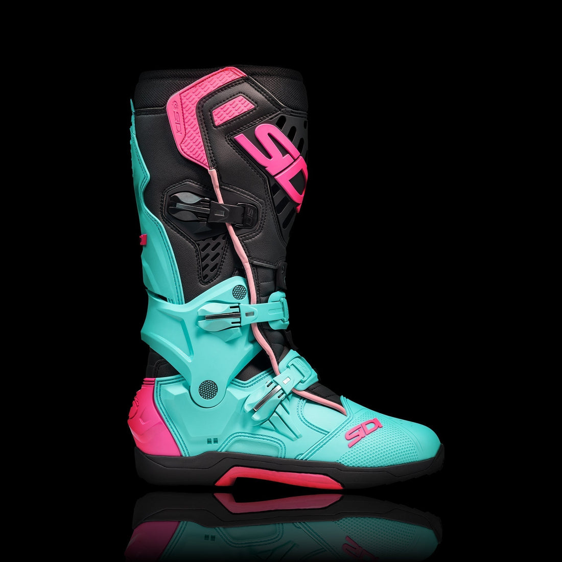 sidi motorcycle off road boots on a black background