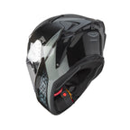 three-quarter rear view of Caberg Drift Evo II Carbon Nova Grey showing four rear extractors and carbon weave