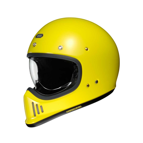 bright yellow full face shoei motorcycle helmet with clear visor