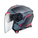 side view of black and red open face helmet with large clear visor