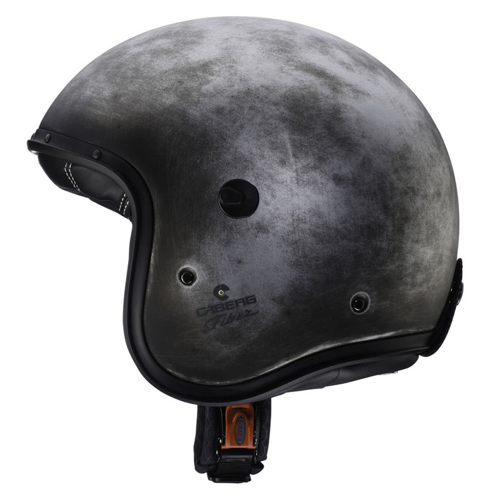 side view of black and white design open face motorcycle helmet