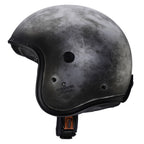 side view of black and white design open face motorcycle helmet