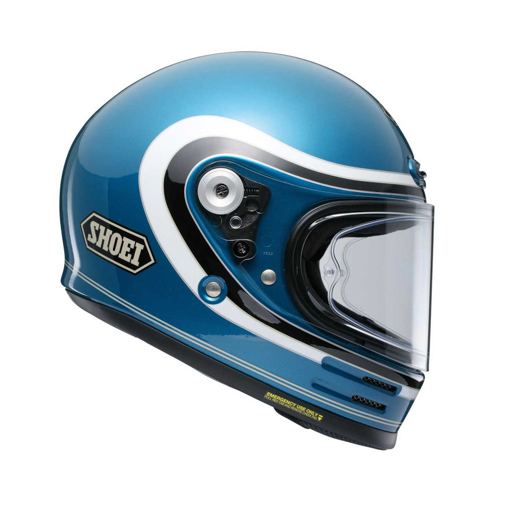Blue motorcycle helmet with a clear visor on a white background