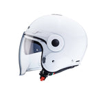 side view of white open face helmet with integrated sun visor