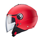 side view of Caberg Riviera V4X matt red helmet showing sun visor mechanism and ventilation